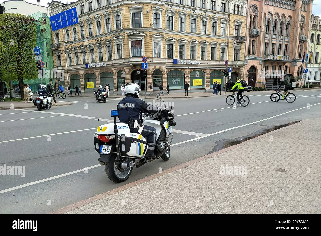 Traffic police on motorcycles block traffic in the center of Riga for cyclists Stock Photo Alamy