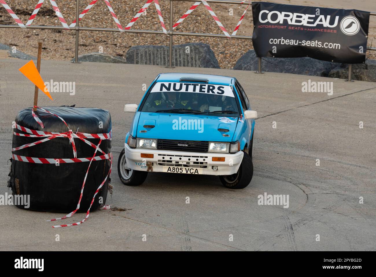 Robert Nutter racing a Toyota Corolla AE86 competing in the Corbeau Seats rally on the seafront at Clacton, Essex, UK. Co driver Simon Nutter Stock Photo