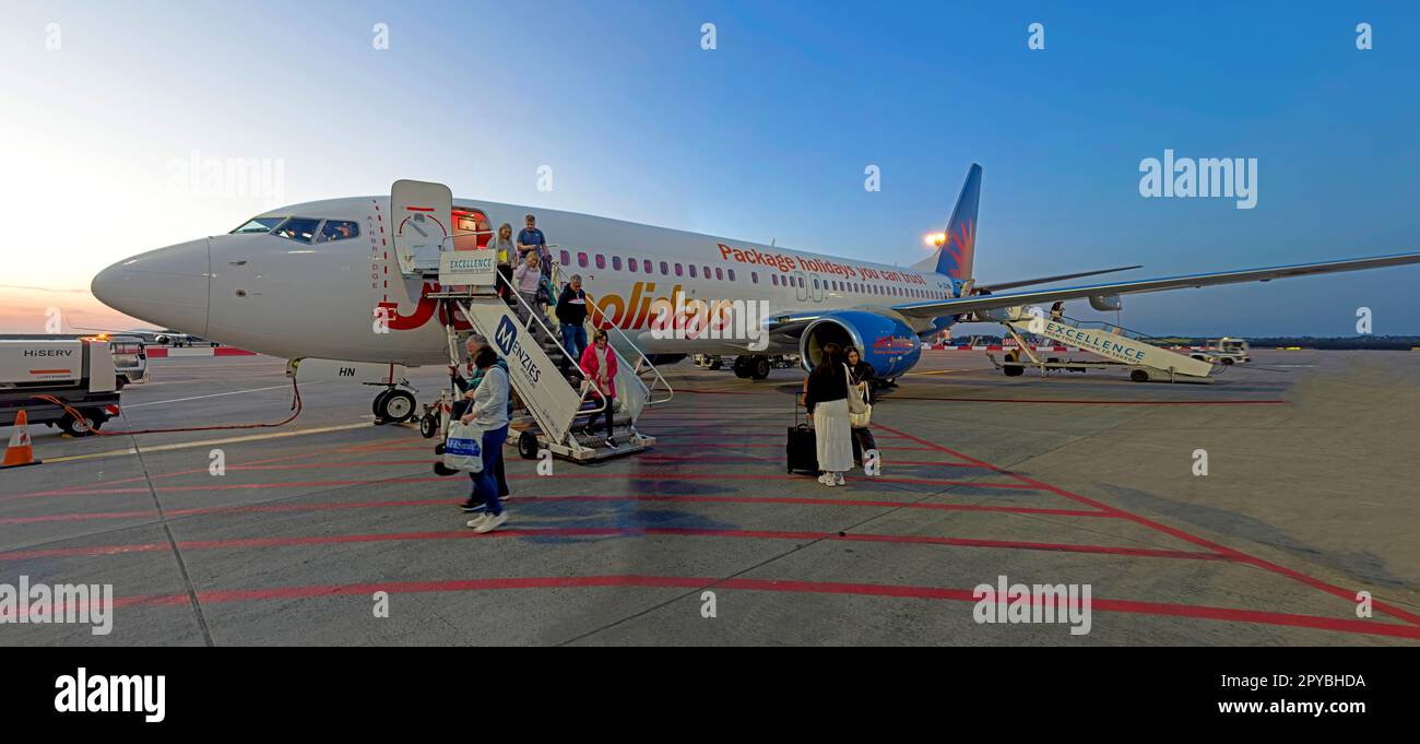 Jet2 plane landed and passengers exiting front door gangway of GJZHN, Boeing 737-8MG panorama, Ferihegy airport flight, Budapest, Hungary Stock Photo
