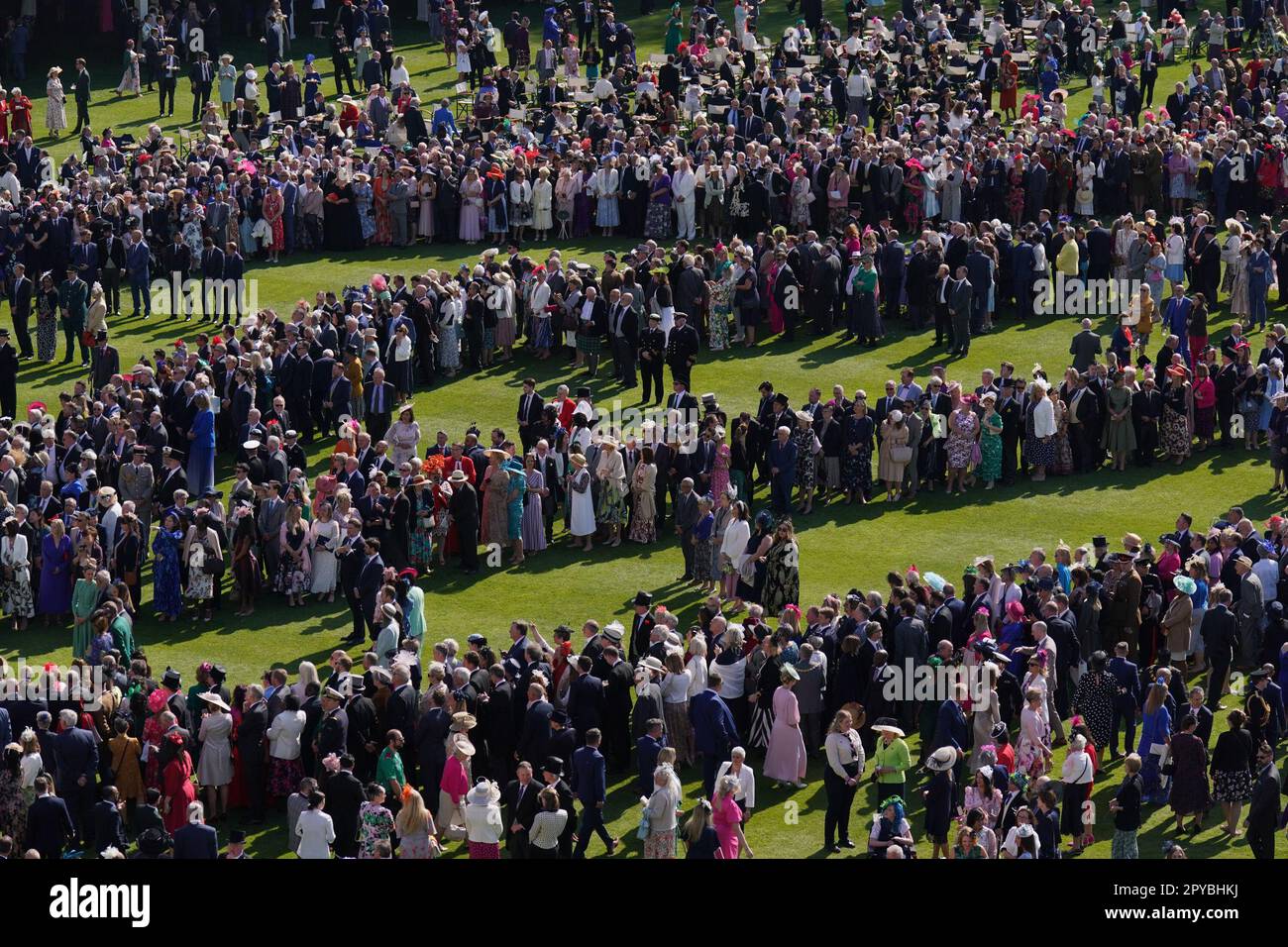 Guests attending a Garden Party at Buckingham Palace, London, to