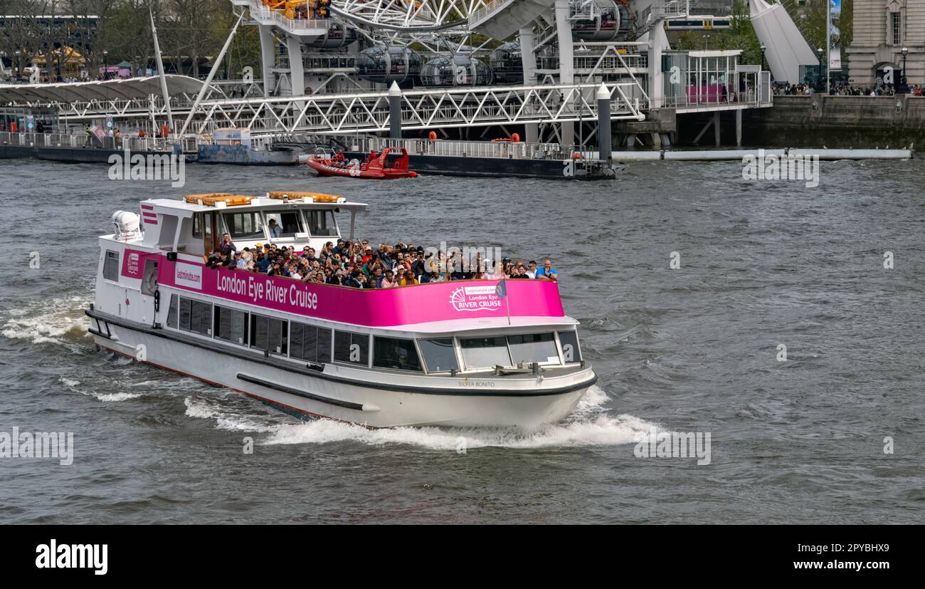 London Eye River Cruise Pleasure Boat with London Eye in the background
