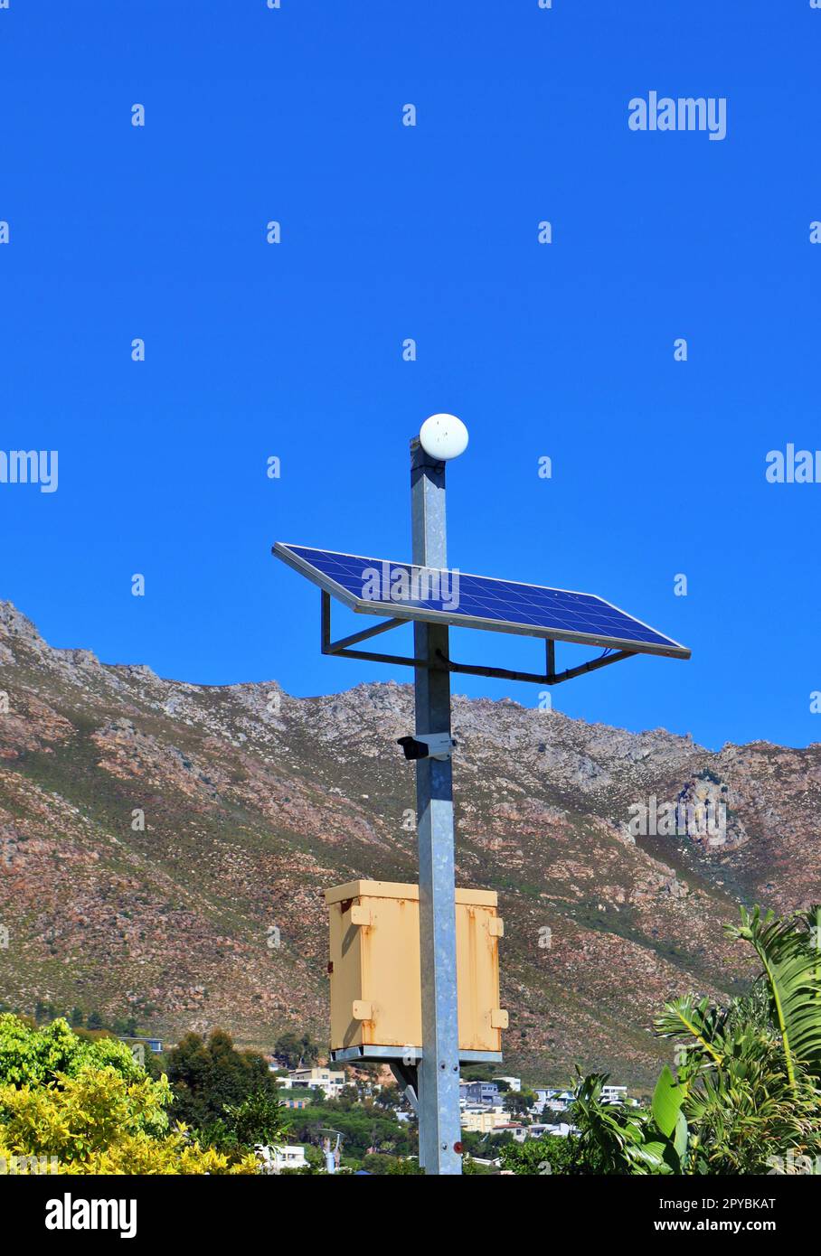 solar-powered surveillance camera in a suburb Stock Photo