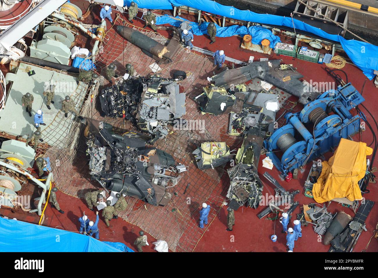 An aerial photo shows the wreckage of a sunken helicopter of the Japan ...