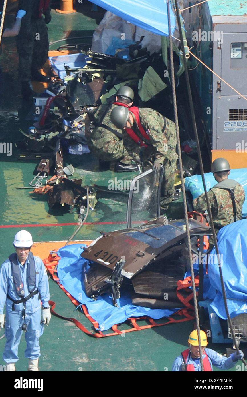 An aerial photo shows the wreckage of a sunken helicopter of the Japan ...