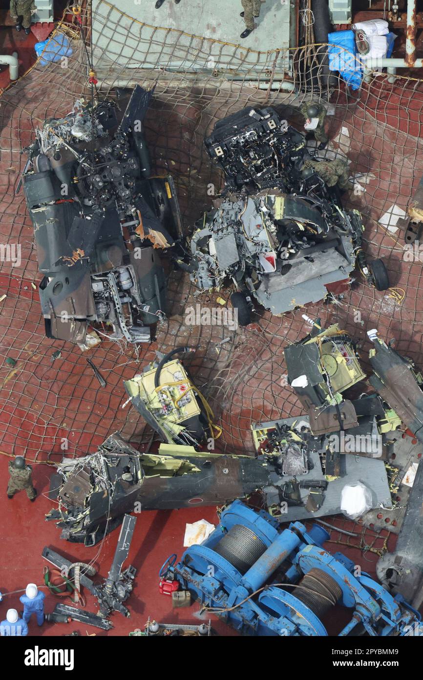 An aerial photo shows the wreckage of a sunken helicopter of the Japan ...