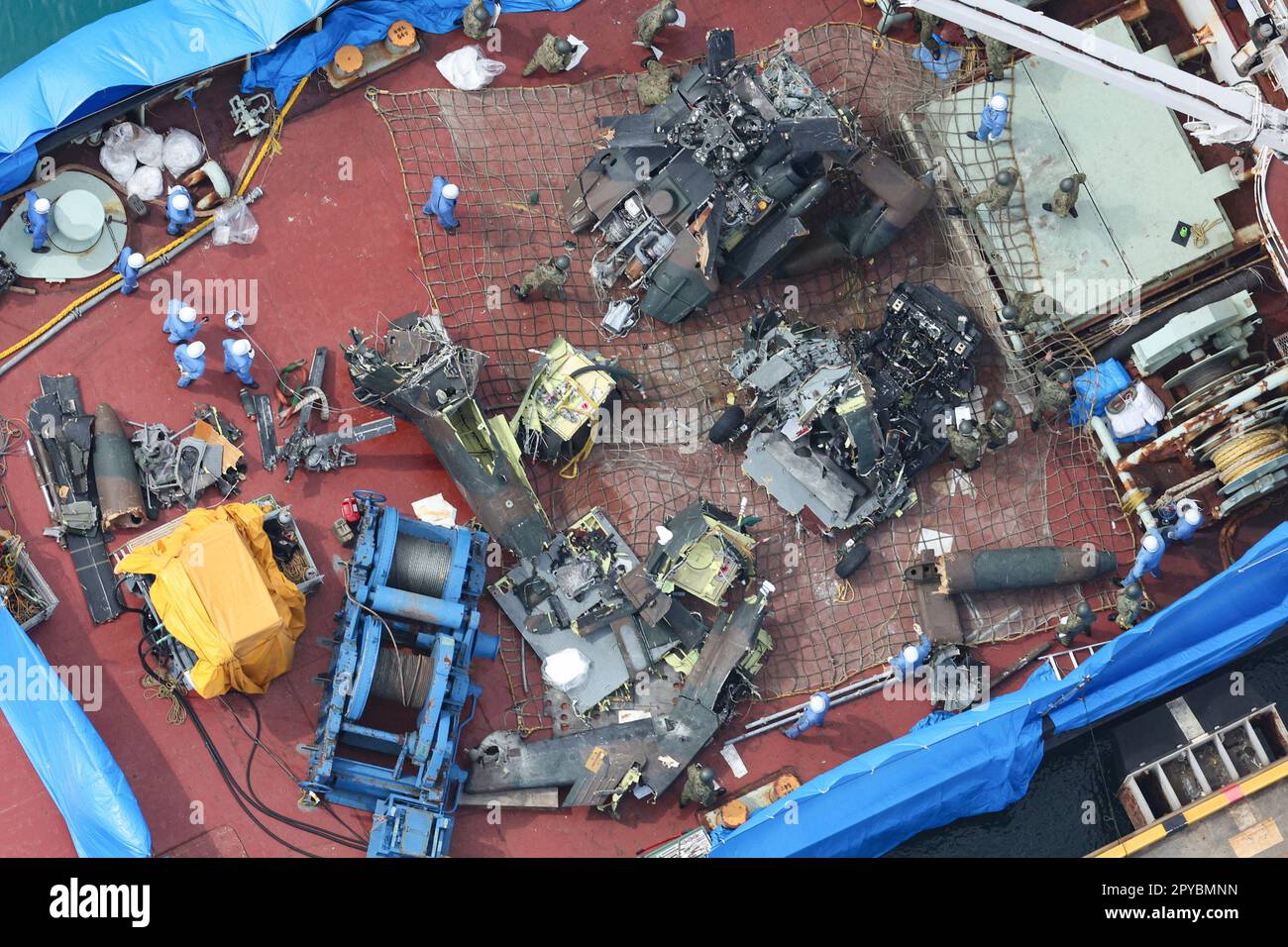 An aerial photo shows the wreckage of a sunken helicopter of the Japan ...