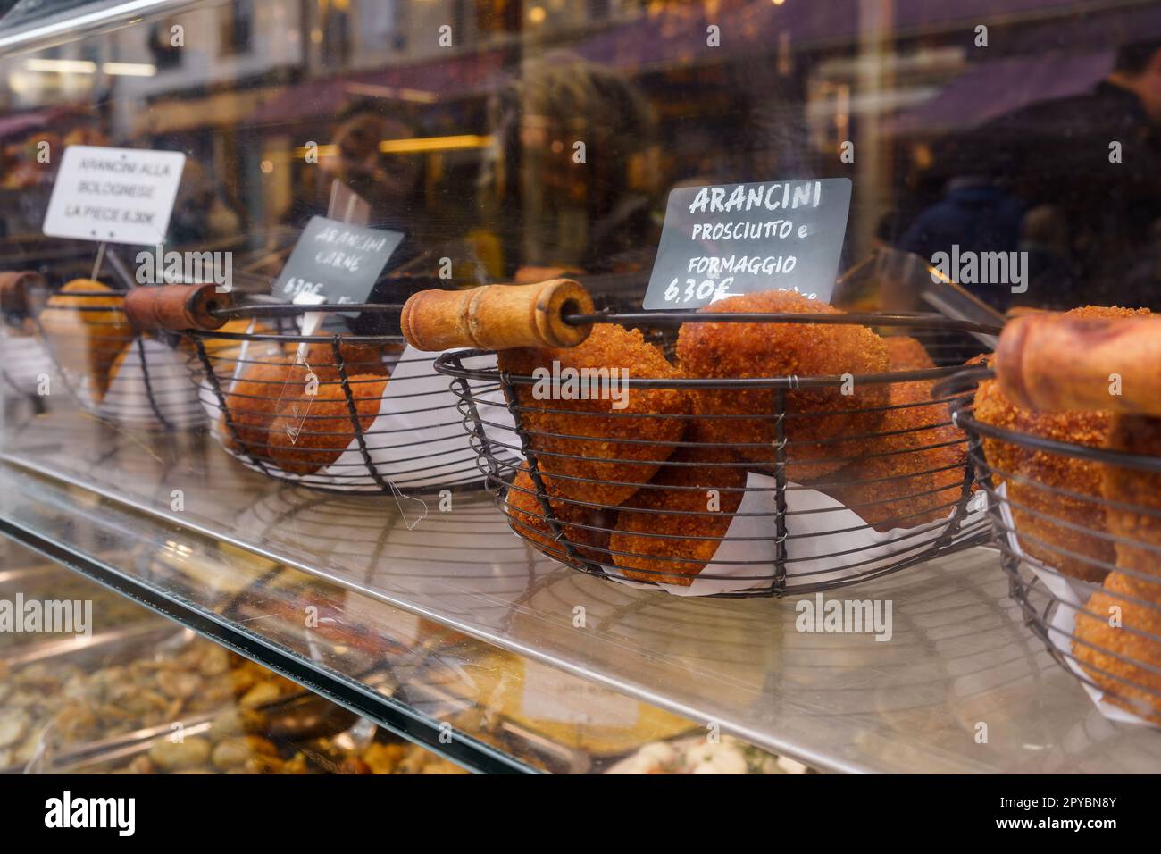 Arancini, the Italian deep fried rice balls filled with prosciutto (dried ham) and formaggio