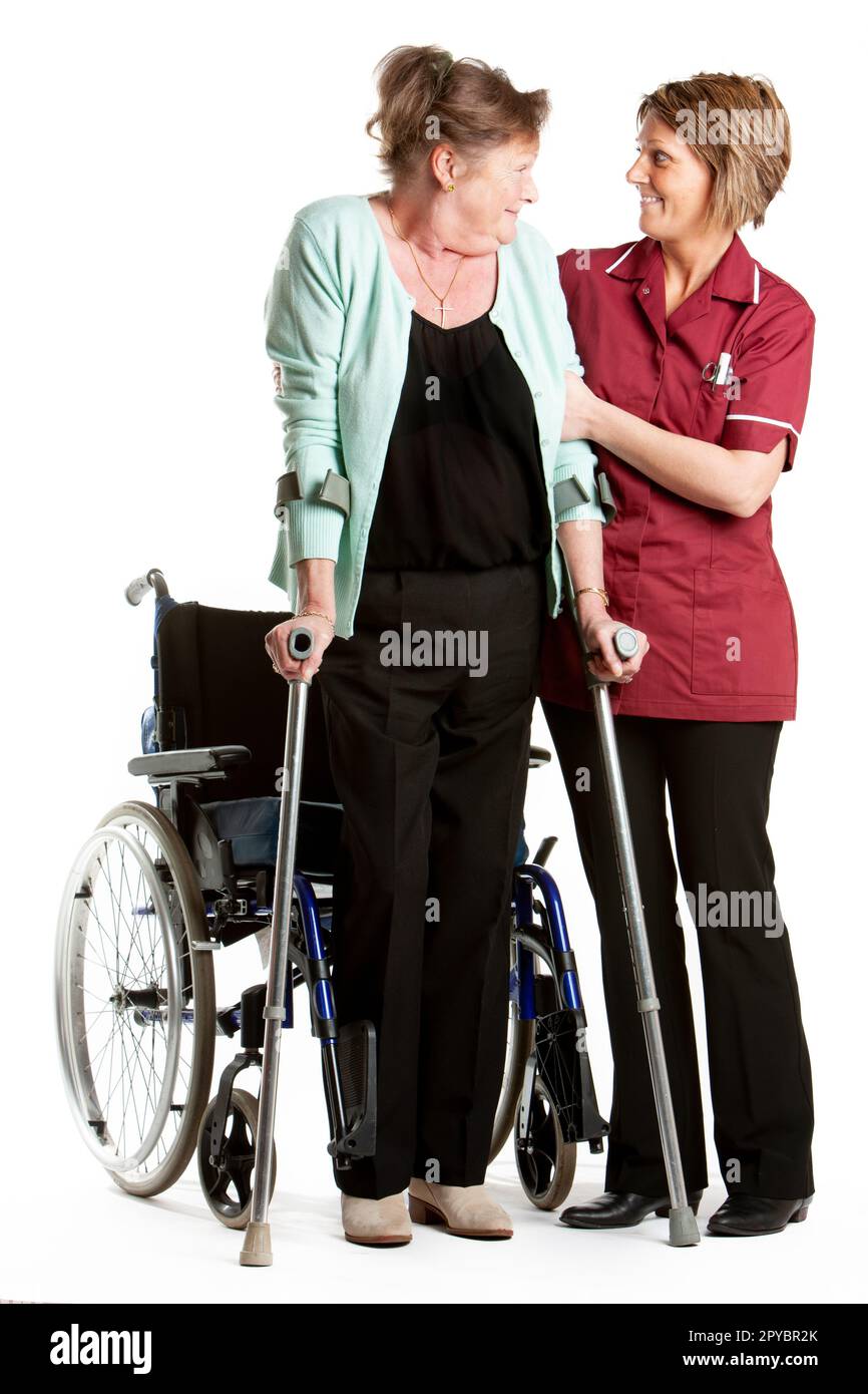 Health Professionals Rehabilitation. A senior patient being helped