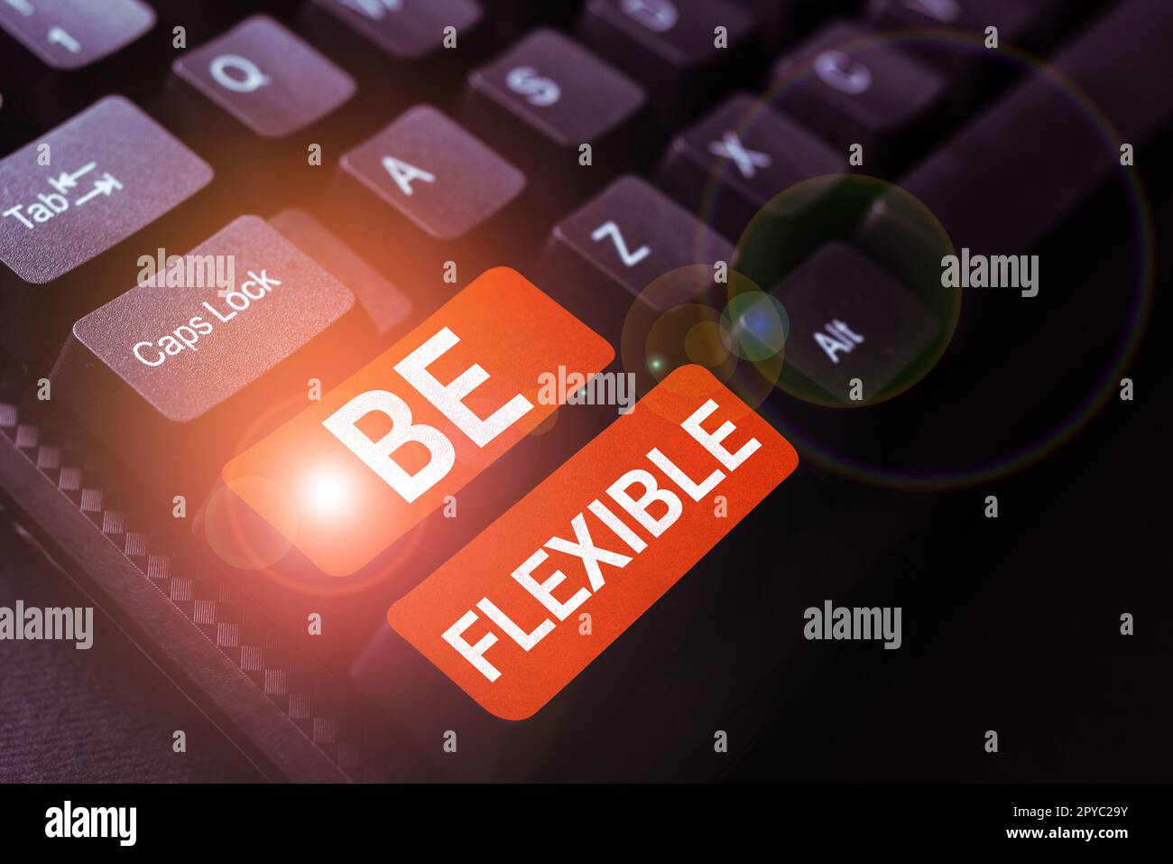 Sign displaying Be Flexible. Word for able to be easily modified to respond to altered circumstances Stock Photo