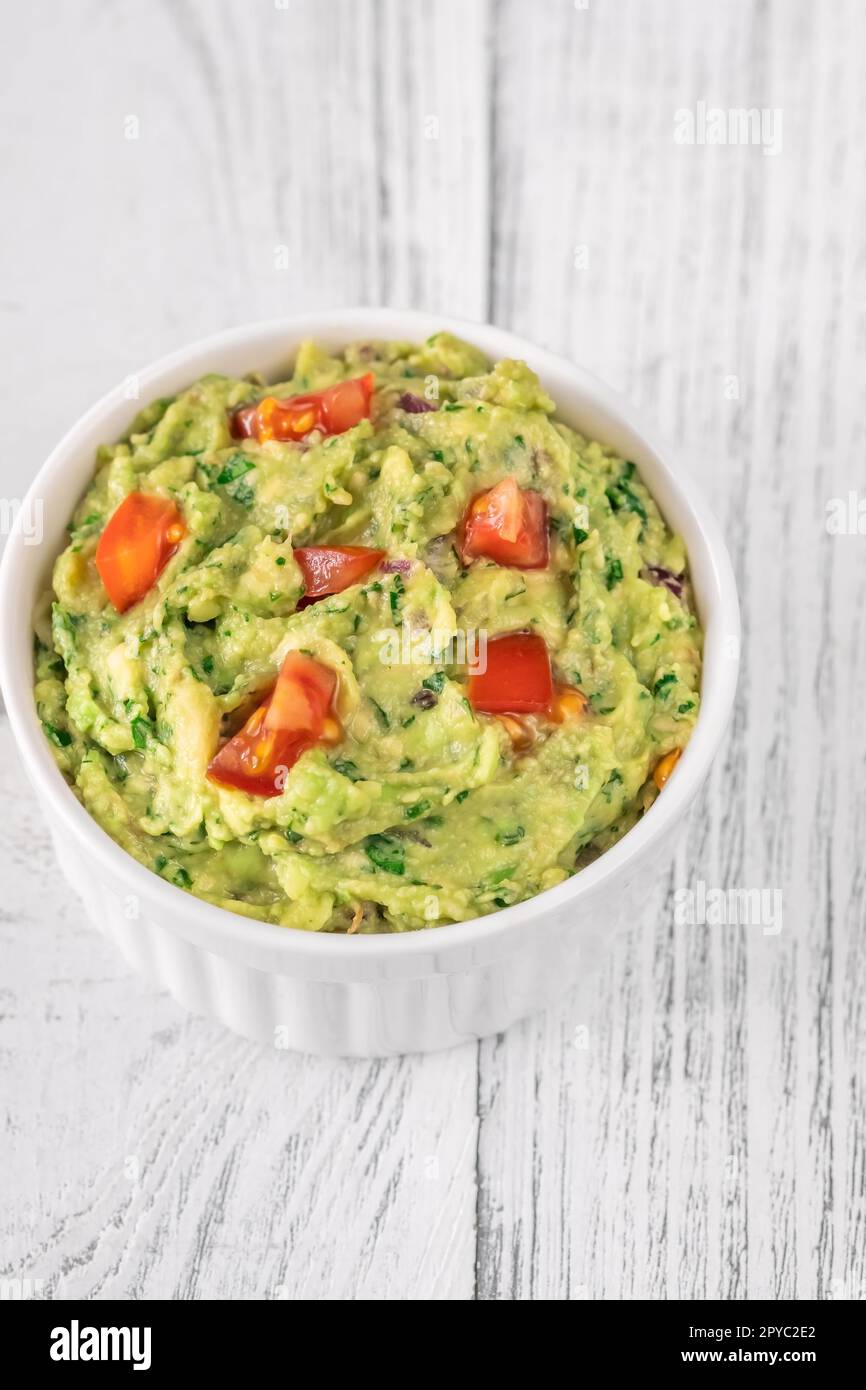 Bowl of guacamole Stock Photo