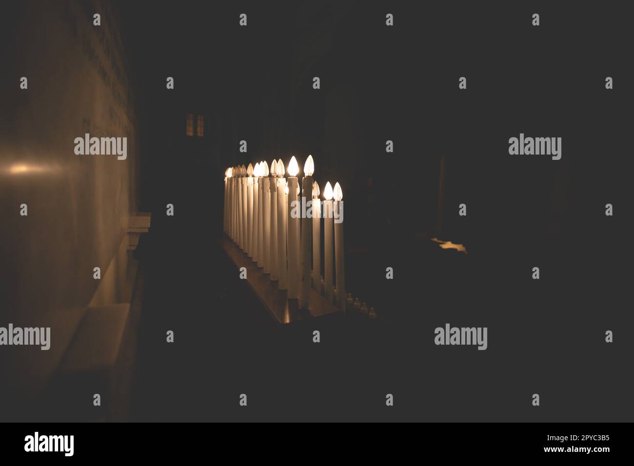 Candle lights in darkness for solemn moments Stock Photo Alamy