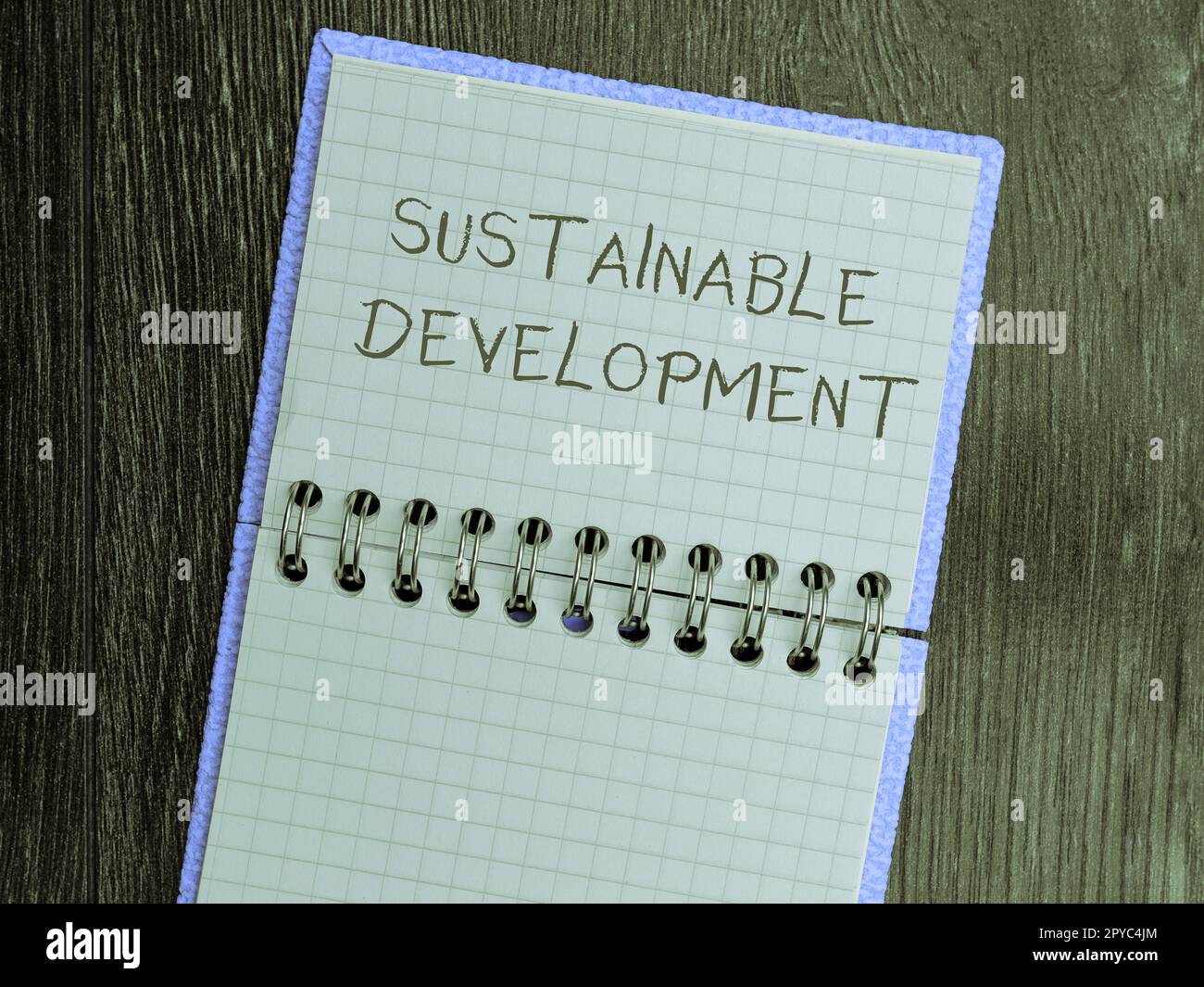 Hand writing sign Sustainable Development. Internet Concept the ability to be sustained, supported, upheld, or confirmed Stock Photo