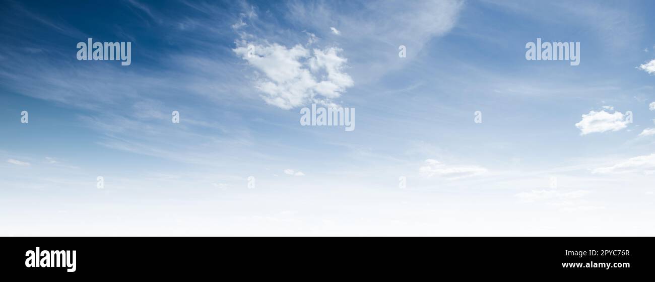 Clear blue sky and white clouds summer background Stock Photo - Alamy