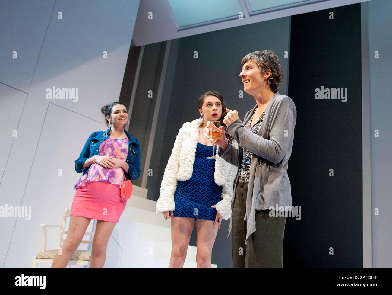 l-r: Seline Hizli (Lyndsey), Bel Powley (Tilly), Tamsin Greig (Hilary) in JUMPY by April de Angelis at the Jerwood Theatre Downstairs, Royal Court Theatre, London SW1  19/10/2011  design: Lizzie Clachan  lighting: Peter Mumford  director: Nina Raine Stock Photo