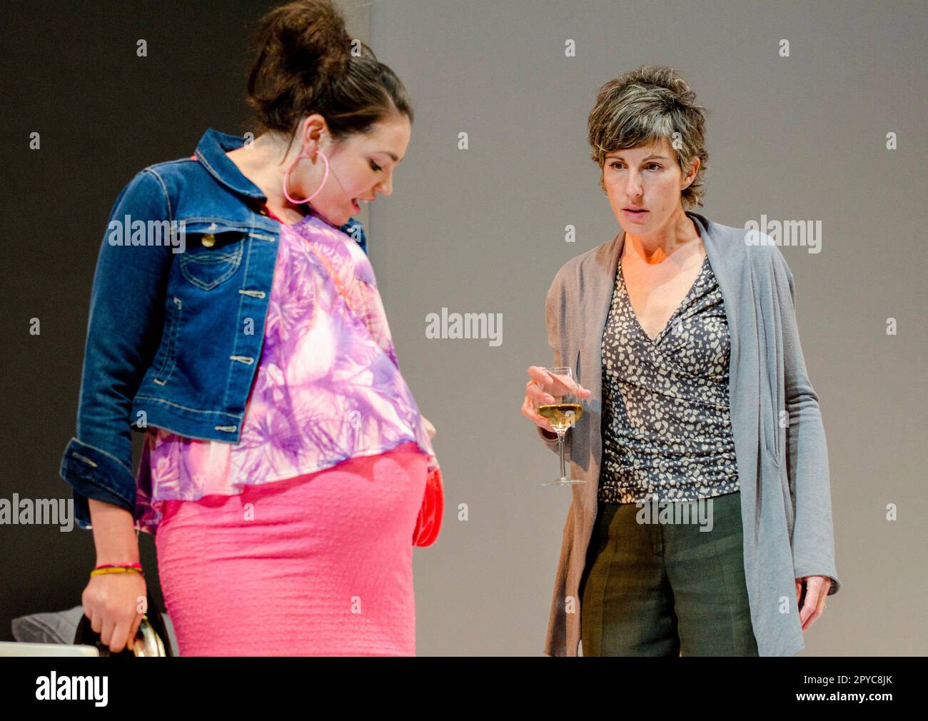 l-r: Seline Hizli (Lyndsey), Tamsin Greig (Hilary) in JUMPY by April de Angelis at the Jerwood Theatre Downstairs, Royal Court Theatre, London SW1  19/10/2011 design: Lizzie Clachan  lighting: Peter Mumford  director: Nina Raine Stock Photo