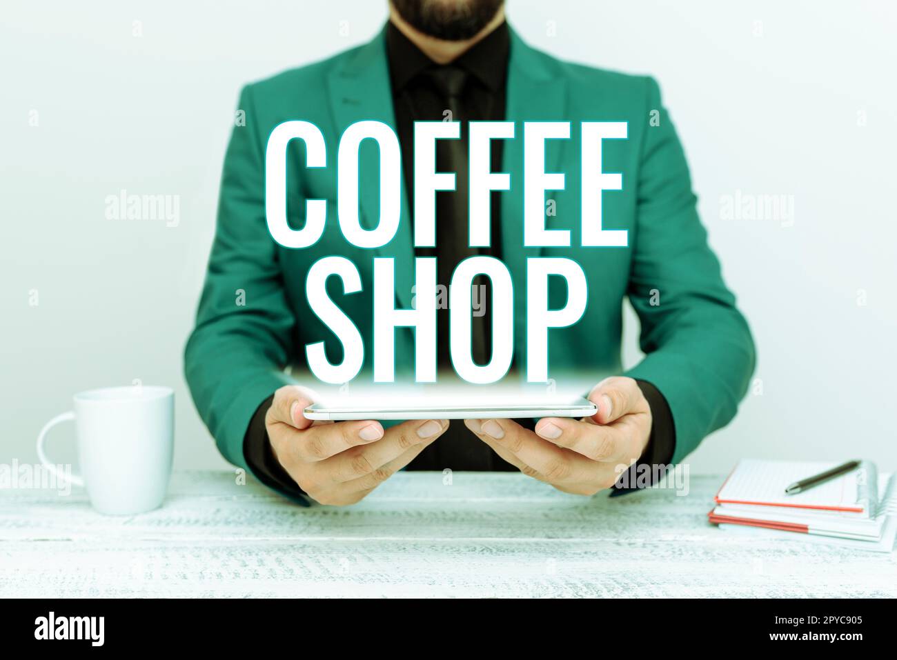 Hand writing sign Coffee Shop. Concept meaning small informal restaurant serving coffee and light refreshments Stock Photo