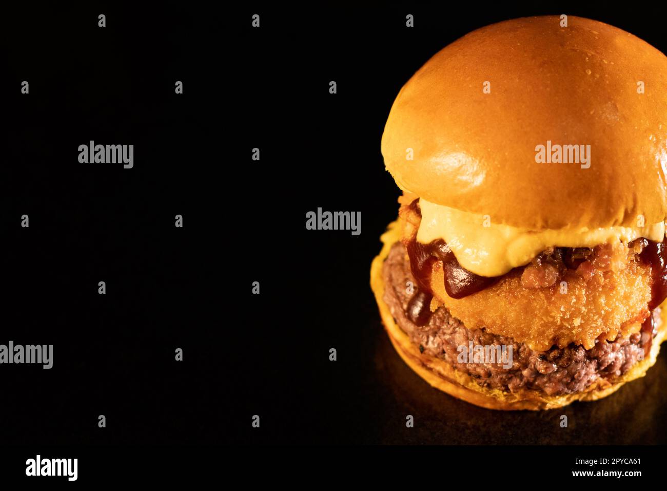 Fresh tasty burger on black Stock Photo
