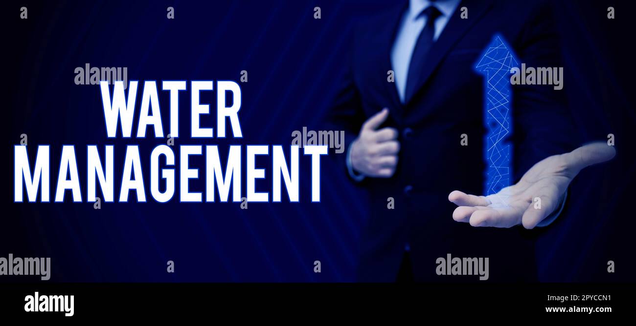 Hand writing sign water management word written on optimum use of