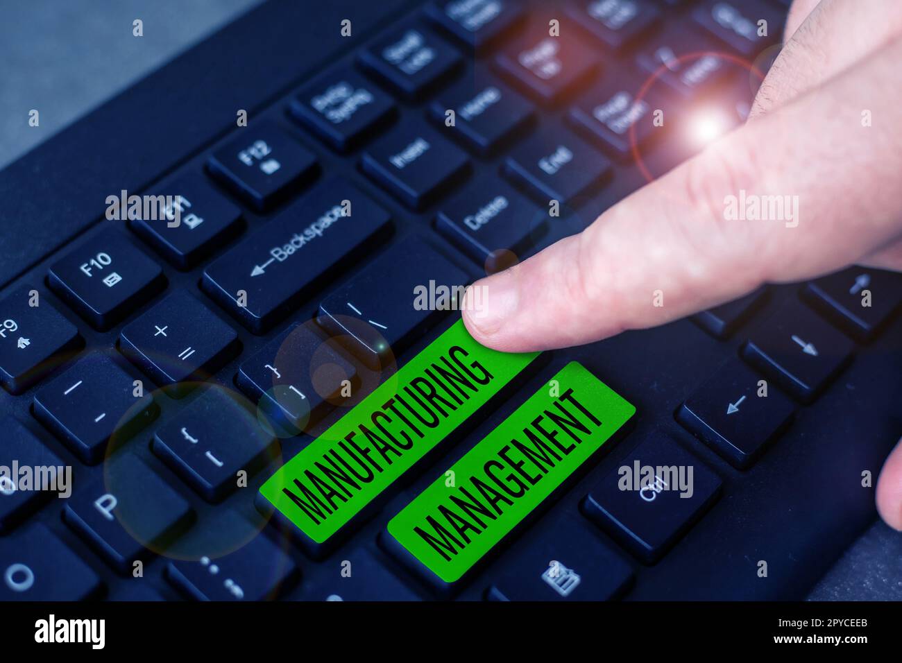 Text caption presenting Manufacturing Management. Business concept