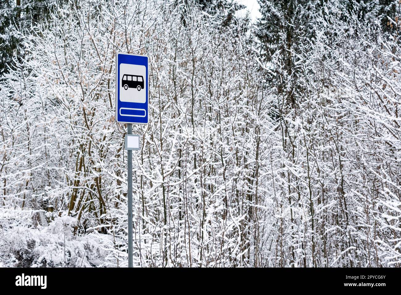 Empty bus stop on a winter road Stock Photo - Alamy