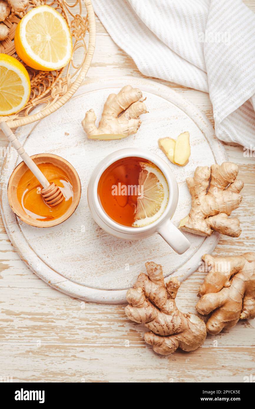 Ginger tea with lemon on a wooden table Stock Photo