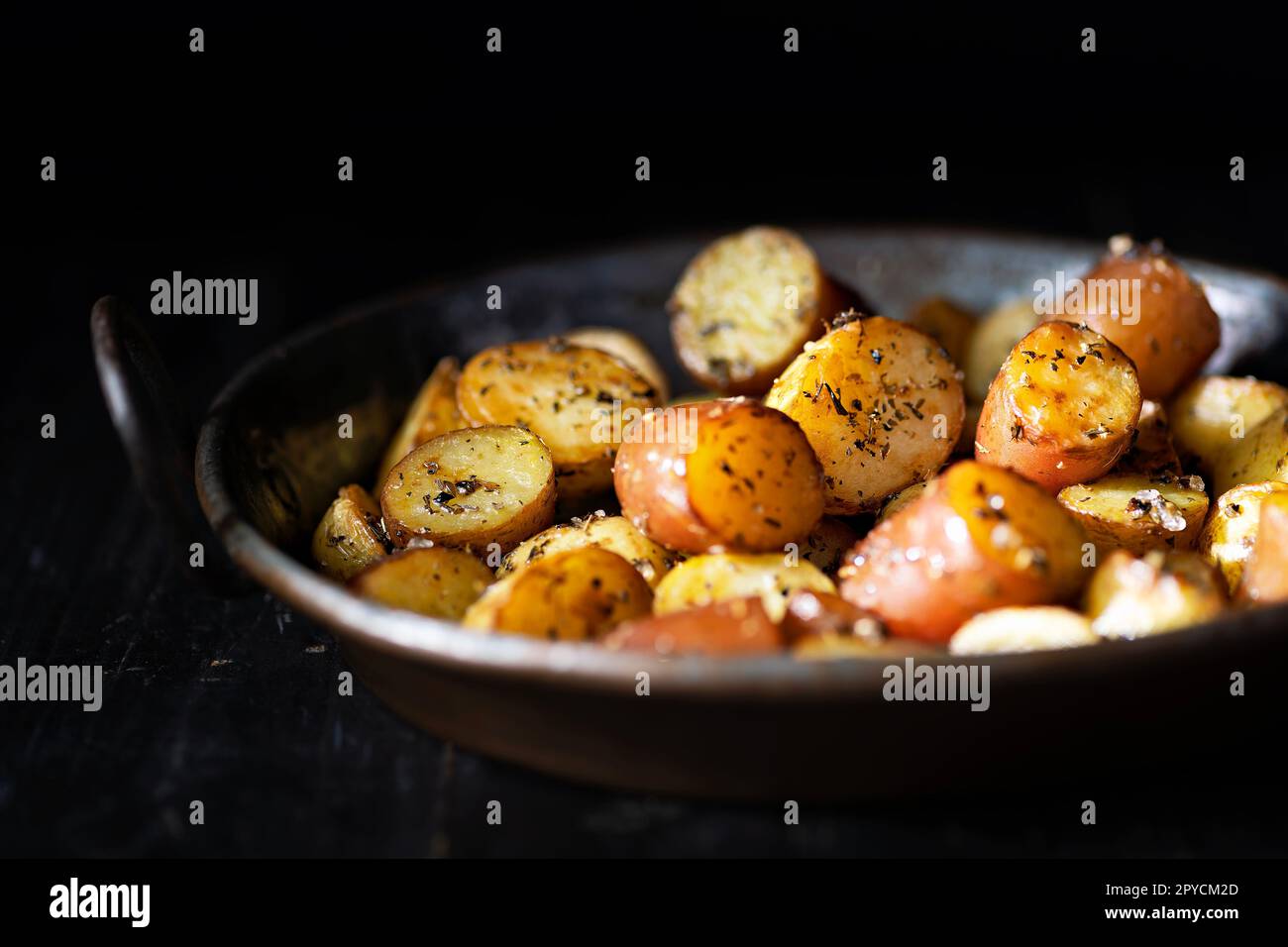 herb roasted baby potatoes Stock Photo Alamy