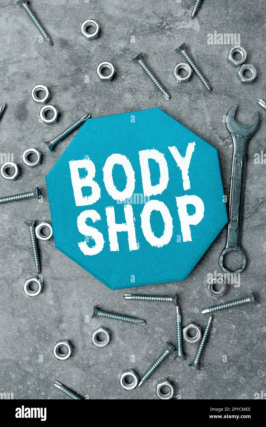 Sign displaying Body Shop. Business showcase a shop where automotive bodies are made or repaired Stock Photo