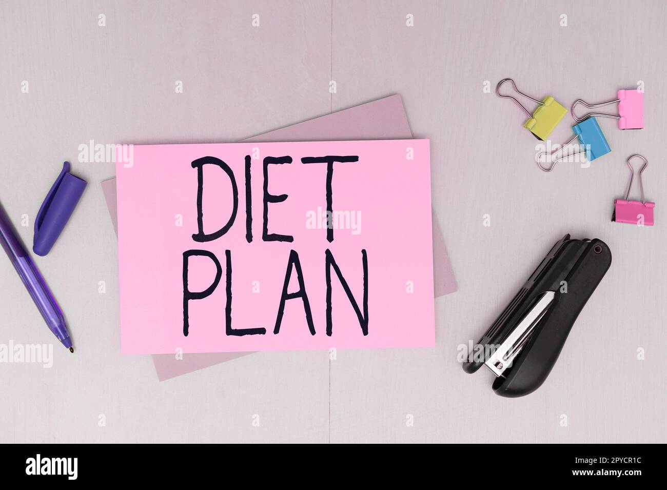 Writing displaying text Diet Plan. Word for Use of specific intake of nutrition for health management reasons Stock Photo