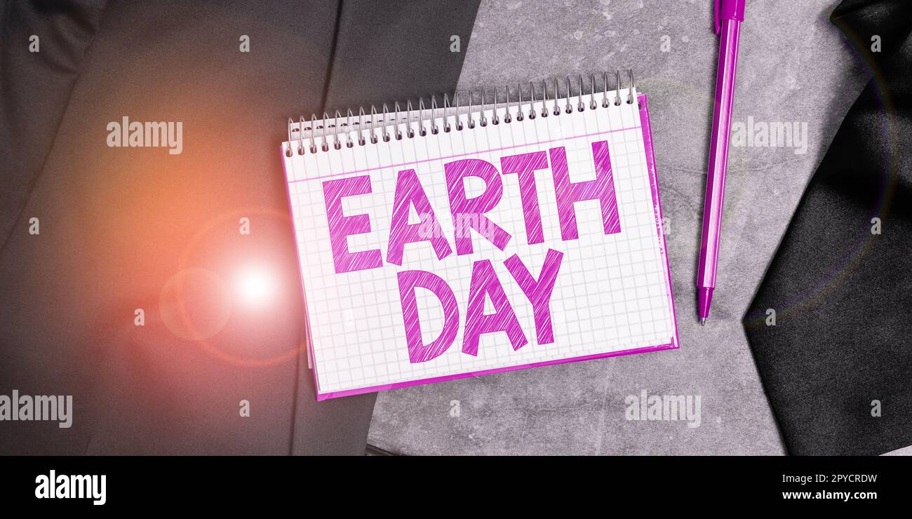 Hand writing sign Earth Day. Word Written on Worldwide celebration of ecology environment preservation Stock Photo