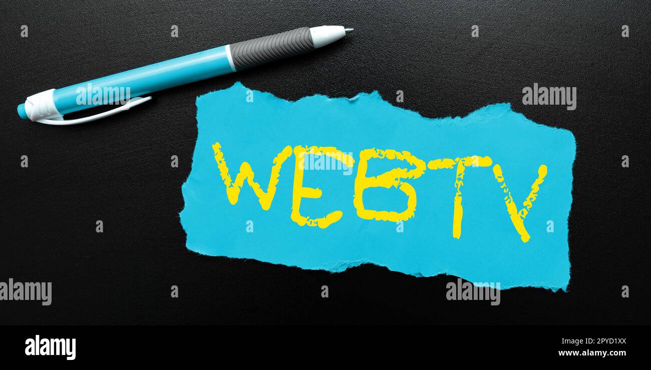 Hand writing sign Webtv. Word for Internet transmission programs produced both online and traditional Stock Photo
