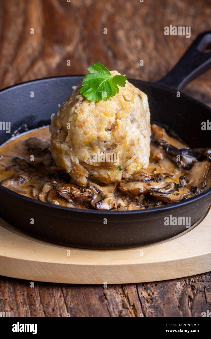 bread dumpling in mushroom sauce Stock Photo