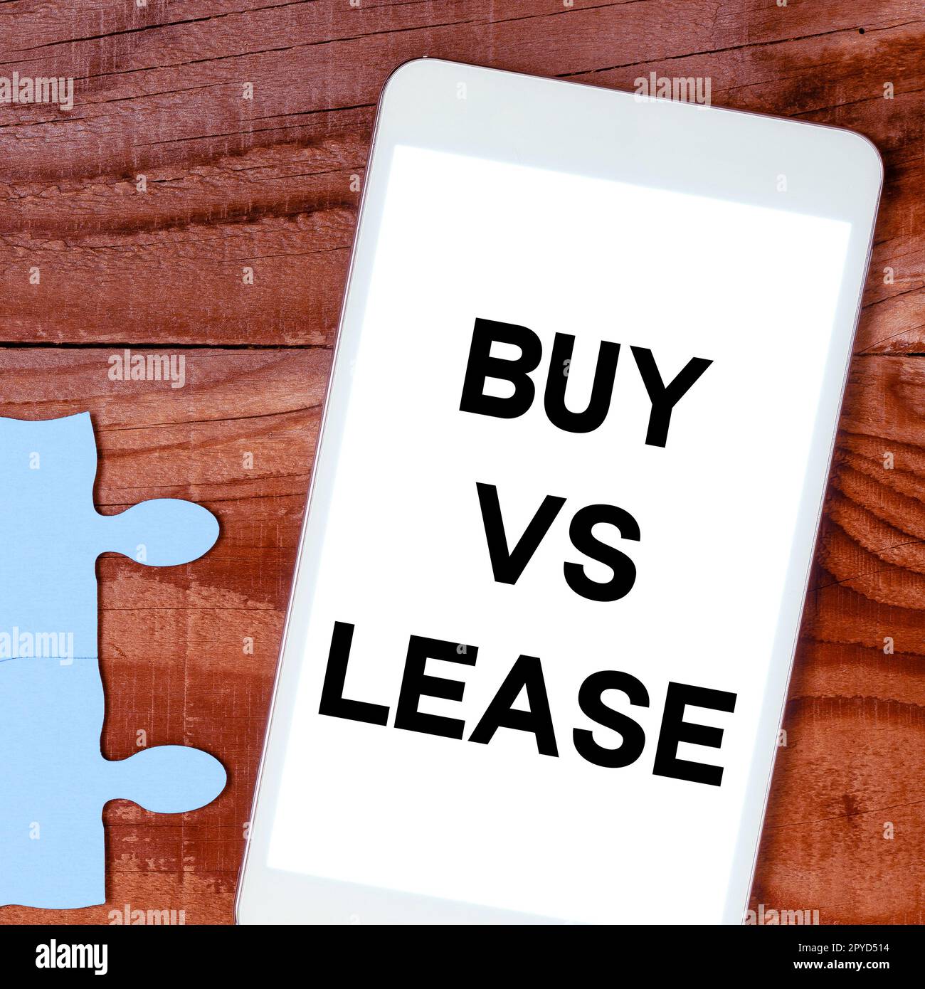 Conceptual display Buy Vs Lease. Business approach Own something versus borrow it Advantages Disadvantages Stock Photo
