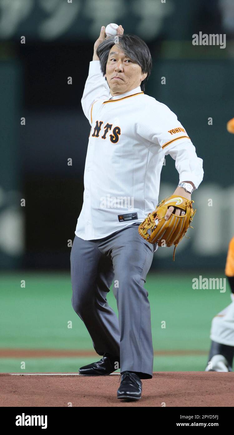 Hideki Matsui, former MLB Yankees and Tokyo Yomiuri Giants player throws  out the ceremonial first pitch prior to the game between the Yomiuri Giants  and the Yakult Swallows at Tokyo Dome on