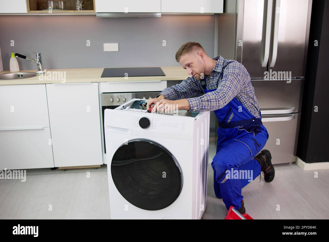 Washing Machine Repair Problem Stock Photo