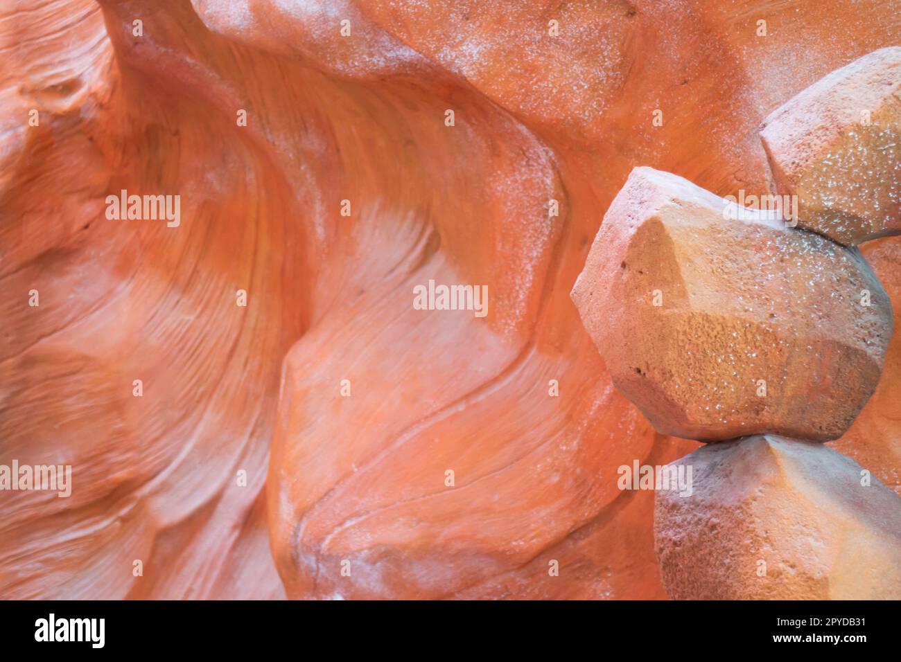 Brown sand-colored stone tiles on the wall Stock Photo
