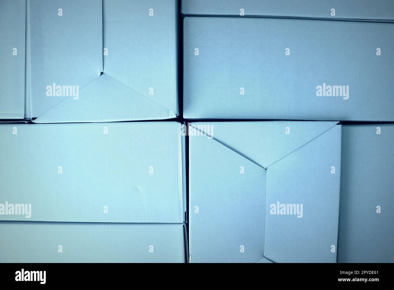 Cardboard boxes seamless pattern on blue background. Stock Photo
