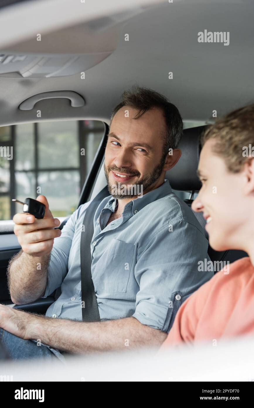 Father teen son in car hi-res stock photography and images - Alamy