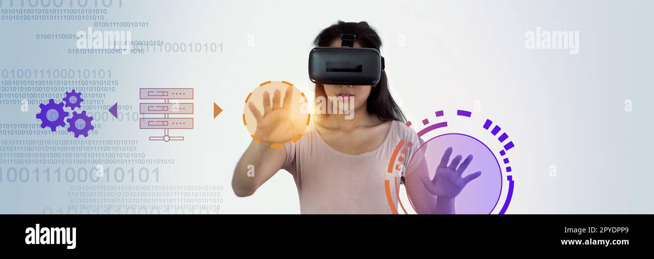 Young asian woman wearing VR glasses virtual Global Internet connection metaverse, Management System, online database automation to efficiently manage files, future technology. Stock Photo