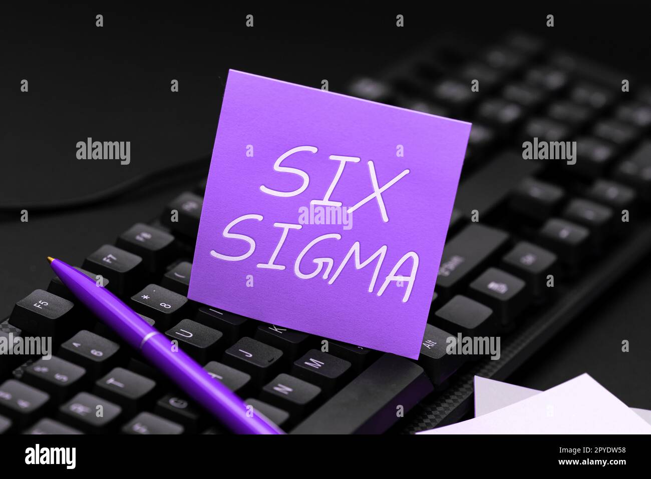 Handwriting text Six Sigma. Business approach management techniques to improve business processes Stock Photo