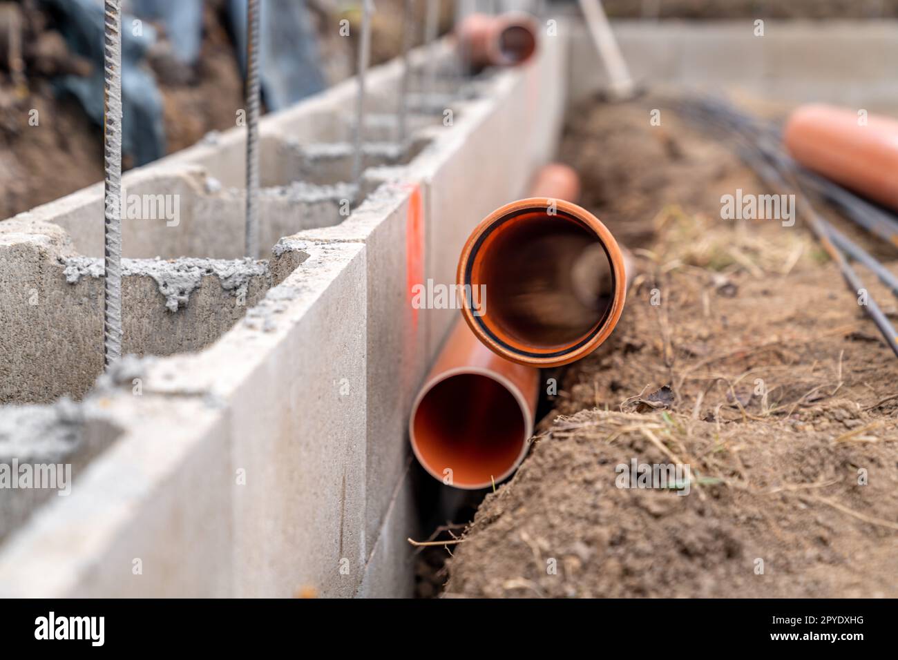 plastic water pipes into the ground Stock Photo Alamy