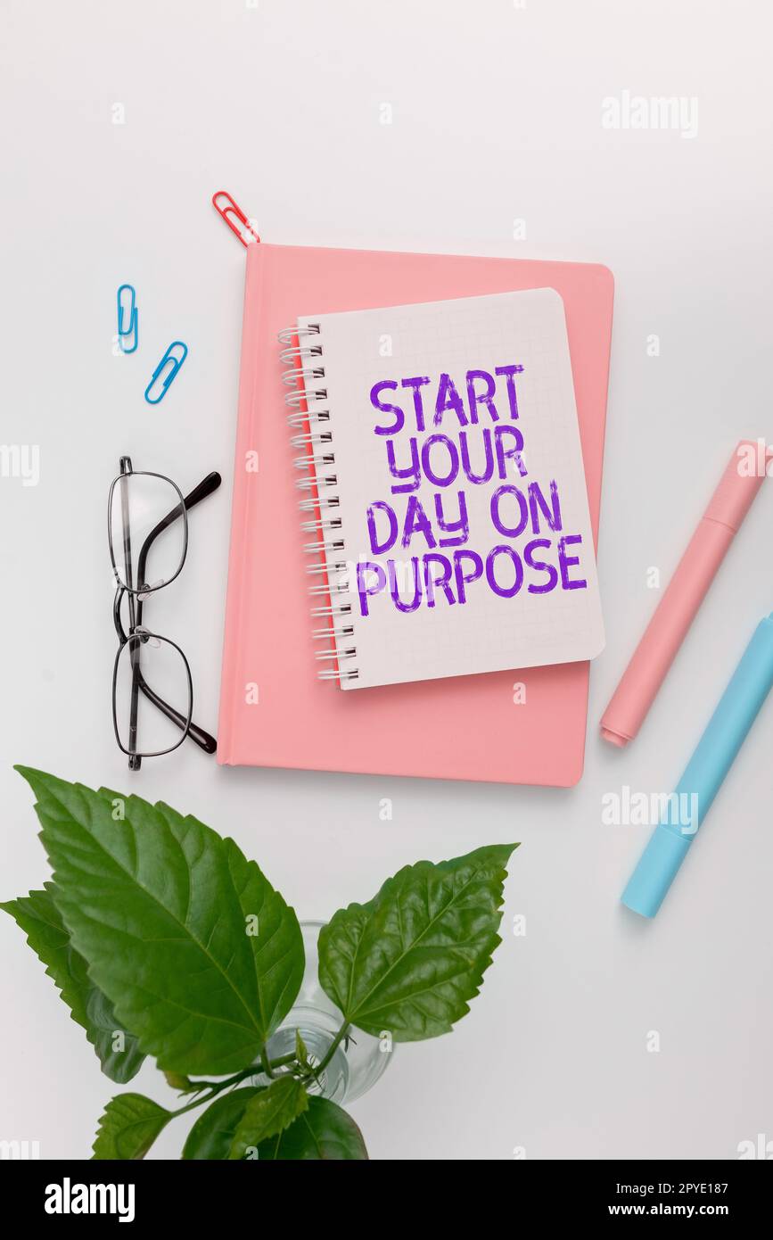 Hand writing sign Start Your Day On Purpose. Business approach Have clean ideas of what you are going to do Stock Photo