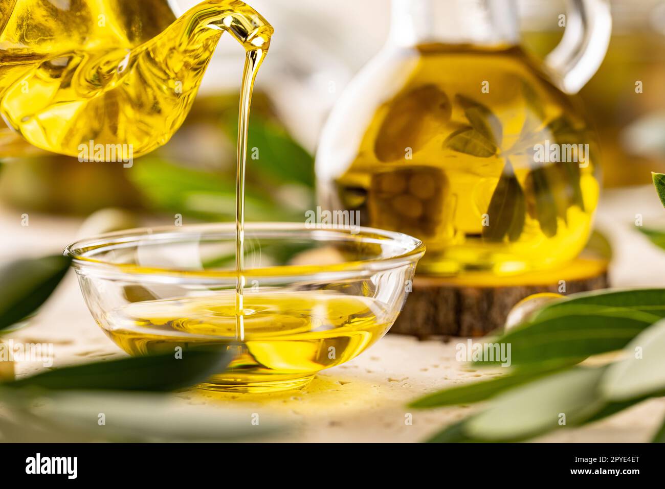 Bottle pouring virgin olive oi Stock Photo
