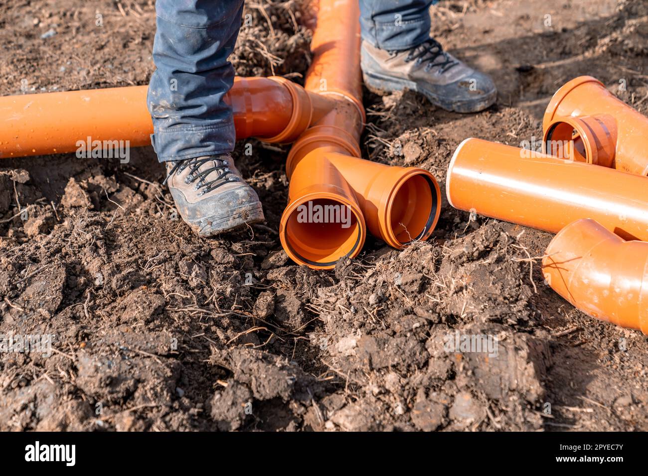 plastic waste pipes in the ground Stock Photo Alamy