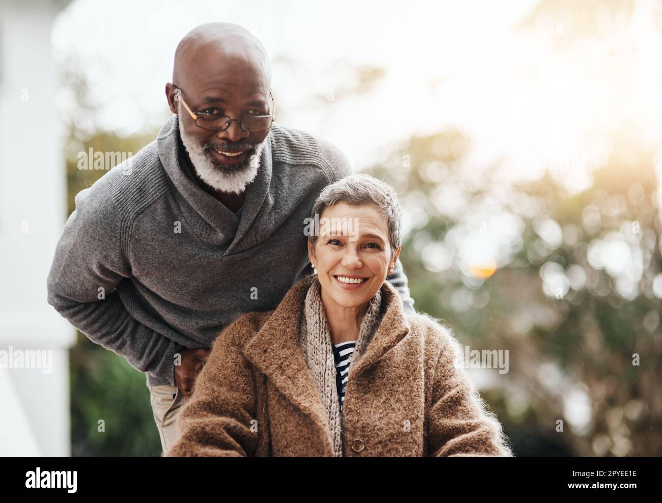 Pushing through the pain. an elderly man pushing his wheelchairbound