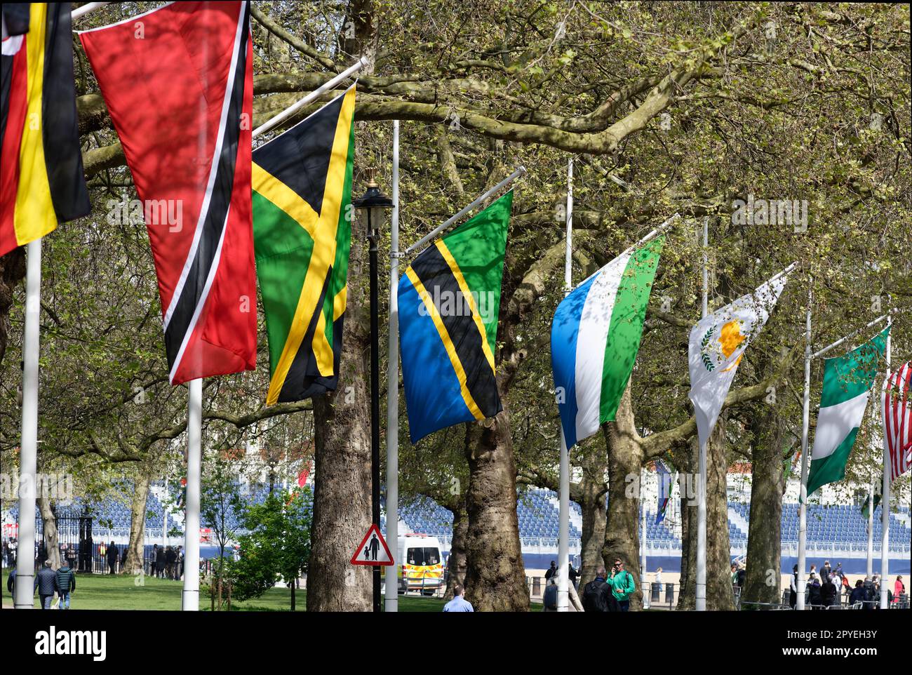 Flags of commonwealth nations Uganda, Trinidad & Tobago, Nigeria, Malaysia, Tanzania, Jamaica, N along Horseguards in London Stock Photo