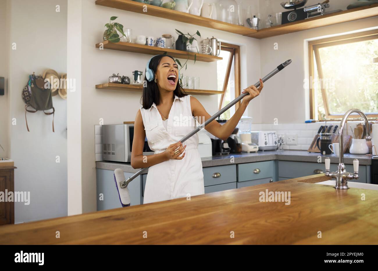 Woman cleaning modern multi cooker in kitchen Stock Photo - Alamy