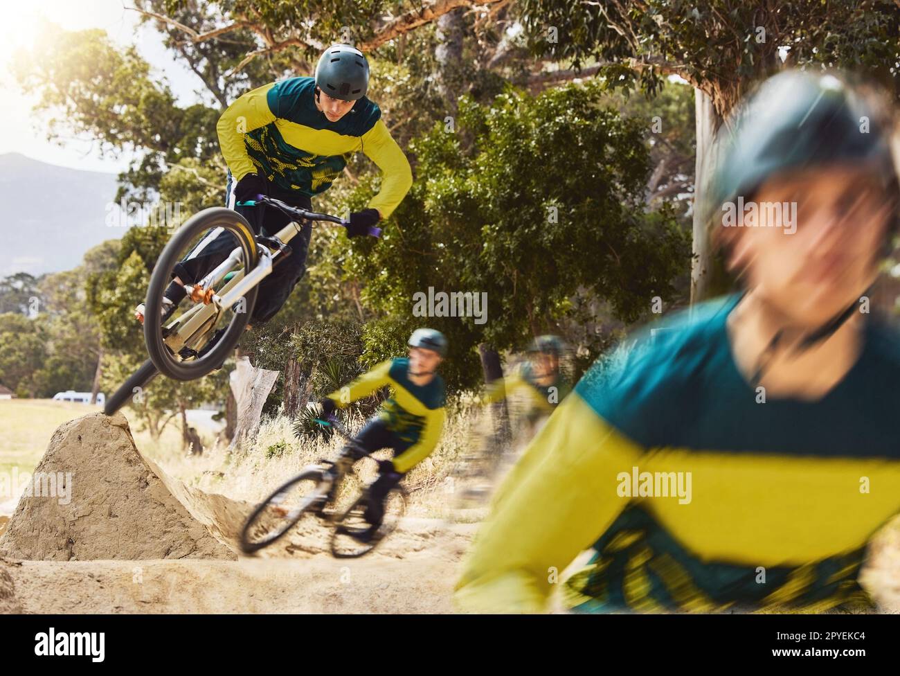 Sport, cycling and bike outdoor with athlete and extreme sports, high jump and stunt in riding park. Movement, fitness and strong with bicycle, cyclist and mountain bike exercise, active and cardio. Stock Photo