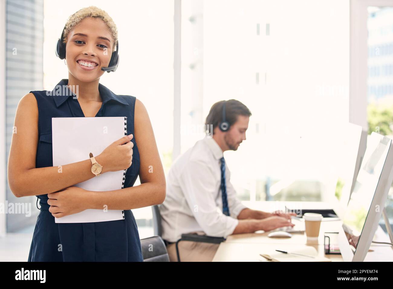 Portrait, manager and black woman in call center, telemarketing and consulting. Client service, team leader and consultant for customer support, advice and telecom sales for communication and smile. Stock Photo