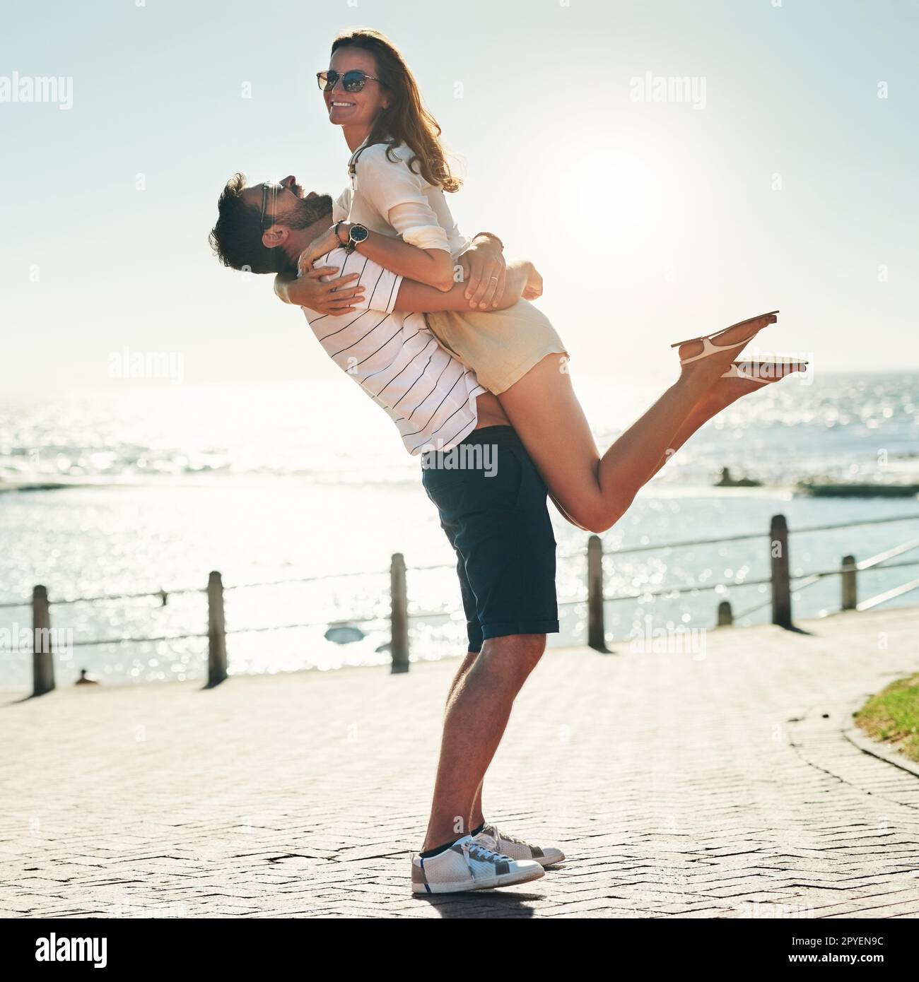 Summer romance goals. Full length shot of a happy young couple embracing on a summers day outdoors. Stock Photo