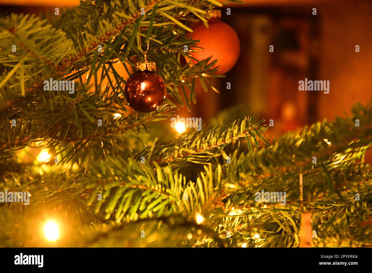 Shiny Christmas tree balls and lights on a Christmas tree in Germany